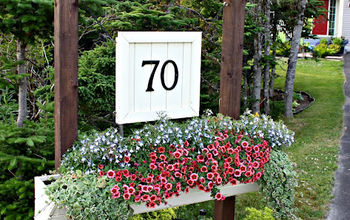 A DIY house number sign including a flower box that myself & my husband came up with.