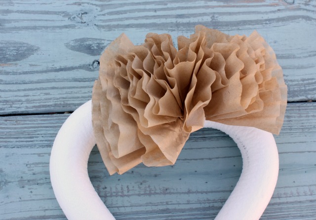 how to make a heart shaped coffee filter wreath, crafts, seasonal holiday decor, wreaths, Starting at the top in the middle of the form glue the ends of the filters to the form Glue them all going the same direction