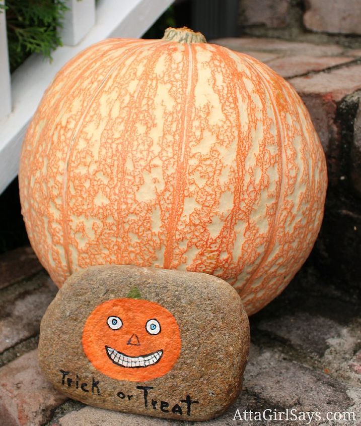 halloween rocks painted rocks make great outdoor halloween decor, chalkboard paint, crafts, halloween decorations, seasonal holiday decor, Paint a pumpkin on a river rock for a fun and easy Halloween craft
