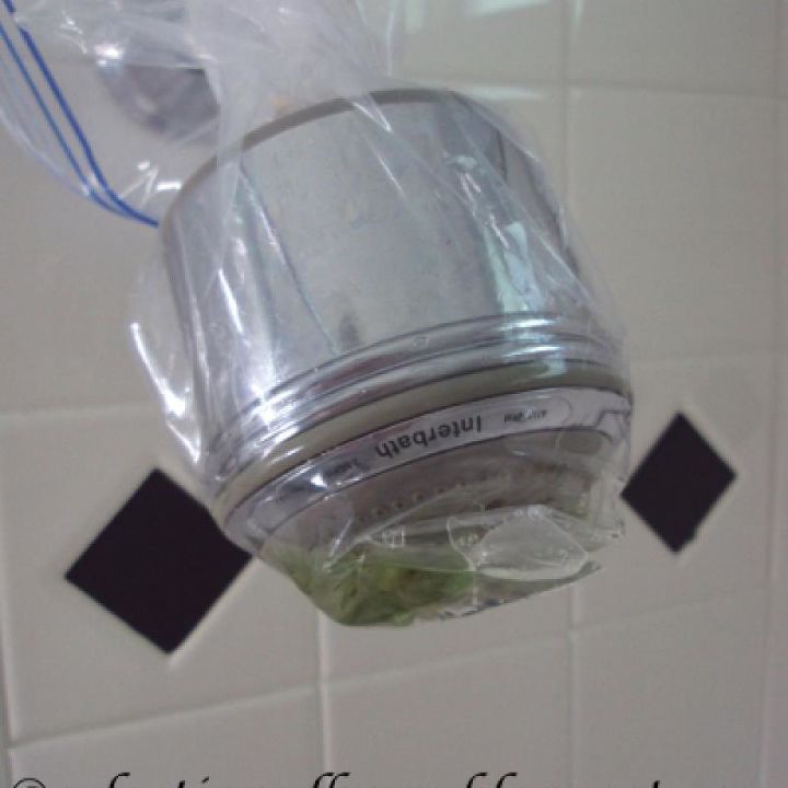 cleaning tips for the bathroom, bathroom ideas, cleaning tips, Using CLR to clean the shower head
