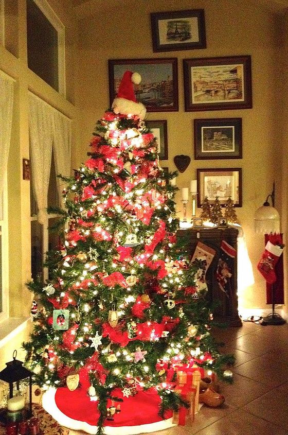 my christmas tree my bedroom mantel, bedroom ideas, christmas decorations, fireplaces mantels, seasonal holiday decor, She wanted RED and a Santa theme w our regular family ornaments