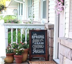 spring summer porch updates, chalkboard paint, crafts, curb appeal, seasonal holiday decor, wreaths, Instant character added with a new wreath potted flowers an easel chalkboard