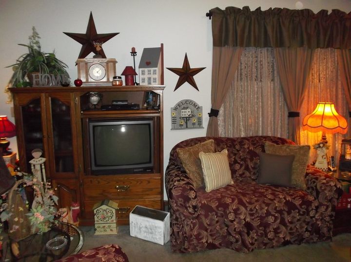 living room d cor on a shoestring budget all second hand lions, fireplaces mantels, home decor, living room ideas, This is the entertainment center and loveseat on my on my front wall