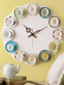 upcycling 5 new uses for old things in home decor, home decor, repurposing upcycling, 2 China Plates I am particularly interested in this one because I collect hand painted antique china plates If I could get the use out of them as a decorative clock That would be so cool I love the tea cup addition to it as