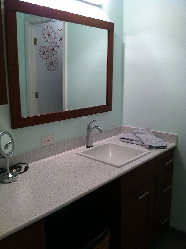 spare bathroom remodel under 4 000, bathroom ideas, home decor, home improvement, Sink heading into the shower area