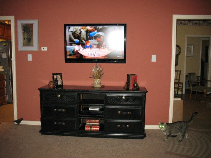 the perfect entertainment set on a budget, painted furniture, repurposing upcycling, Here s how it looks under the TV It holds all the DVD s CD s Wii games batteries etc