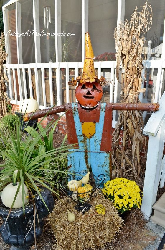 a country cottage s fall porch tour, decks, porches, seasonal holiday decor, wreaths, Rusty is waiting on you so come on in