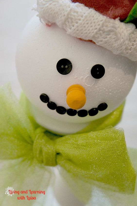 diy candlestick snowmen, christmas decorations, crafts, seasonal holiday decor, Add eyes and nose Visit blog to find out what I used for the nose You could also add some twig arms that would make them super cute