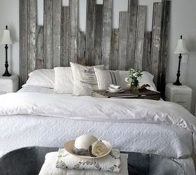 reclaimed wooden headboard, home decor, woodworking projects, A vintage cowboy tub at the end of the bed provides storage for extra pillows and quilts