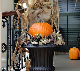 southern fall porch, porches, seasonal holiday decor, simply place a pumpkin in the center of the urn and fill in with dried leaves and pine cones from your yard or woods