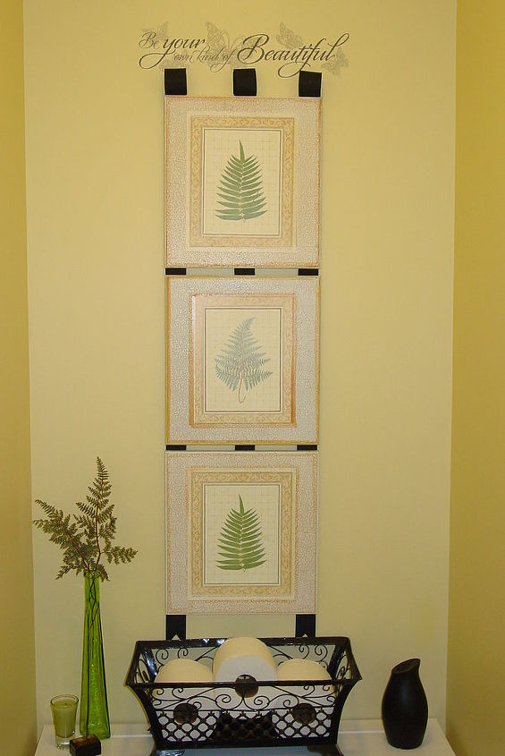 a quick easy bathroom project, bathroom ideas, home decor, I love my fern plaques and how the black ribbon draws the eye to them The cute little wall quote was only 97 cents at Wal Mart