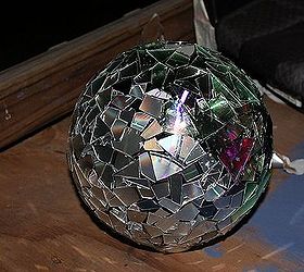 homemade gazing balls, repurposing upcycling, Third ball Recycled CDs Total pain in the hand scissors to cut up the CDs but great looking product