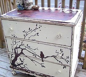 chipping old paint for beautiful designs, painted furniture, The After Picture of the Chirpy Chippy Dresser She is the only piece so far we haven t allowed to go up for sale that s how much we love her We allowed the natural Mahogany to show through as the wood of the tree