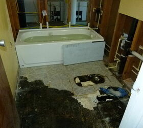 bathroom remodel, bathroom ideas, home improvement, New Tub in place Old tile floor in process of being scraped up
