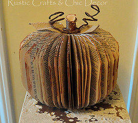 transform an old paperback book into a decorative pumpkin, crafts, The finished project with a birch stem burlap leaves bark covered wire and painted paper edges