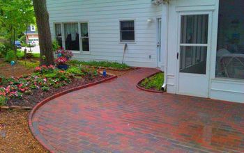Installing pavers over your existing patio is a great way to change the look of your outdoor space.