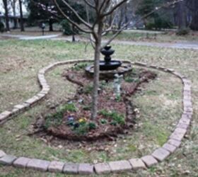 Enlarging fountain/flowerbed in front yard.  Have scrapped gass and filled in since photo was taken.  Hope to get…