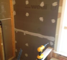 good example of a failing shower due to incorrect installation and having to do it, home improvement, We removed the damage installed a new sub deck and went back with the WEDI system sub paneling
