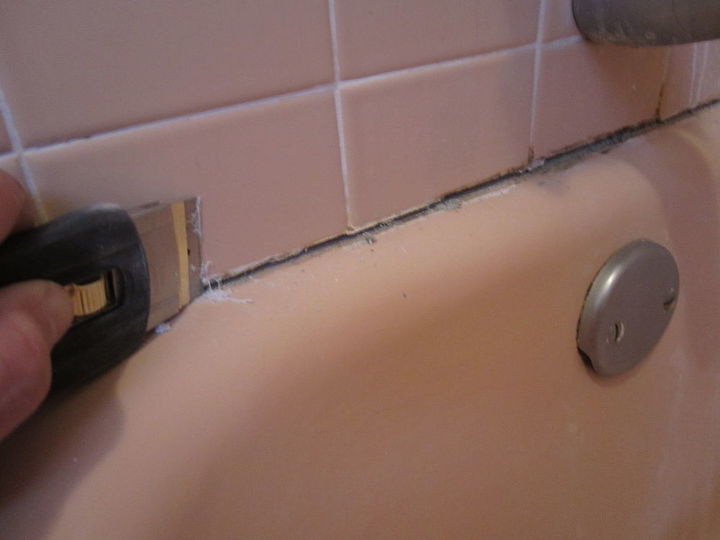 what to do about that leaky shower and tub caulking once and for all best charles, home maintenance repairs, how to, With a razor blade holder clean the remaining caulk off of the surface of the tile and tub