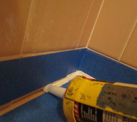 what to do about that leaky shower and tub caulking once and for all best charles, home maintenance repairs, how to, Fill the gap with sealant pushing sealant ahead of the nozzle The little bulge of sealant in front of the nozzle is the only way you will know that the gap is filled