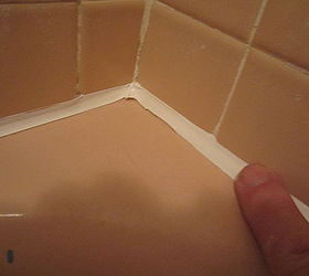 what to do about that leaky shower and tub caulking once and for all best charles, home maintenance repairs, how to, After removing the tape there will be little bit of a heavy edge which you can easily smooth down with a last light pass of your soapy finger