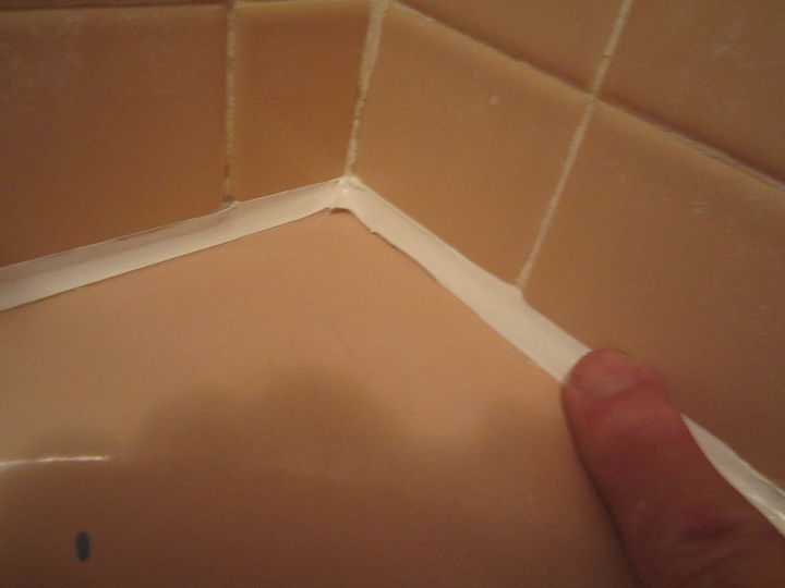 what to do about that leaky shower and tub caulking once and for all best charles, home maintenance repairs, how to, After removing the tape there will be little bit of a heavy edge which you can easily smooth down with a last light pass of your soapy finger