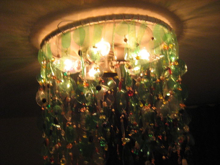 i wanted a chandalier but i wanted what i wanted so i made it i used water, lighting, repurposing upcycling