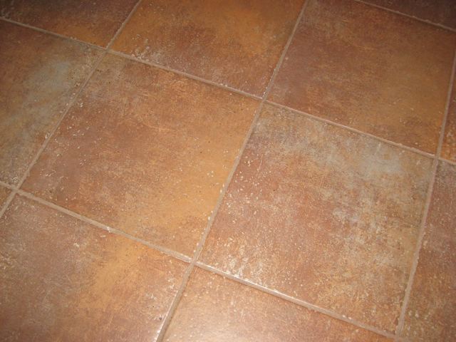 installing state tile flooring in laundry room, home decor, laundry rooms, tile flooring, tiling