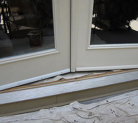prevent door bottoms from rotting or rusting by installing a drip edge, After painting the drip edge looks like part of the door