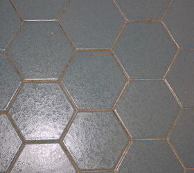 1970 s blue bathroom, the floor tile up close