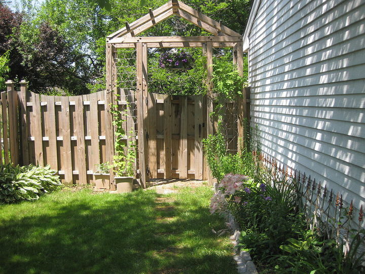 my husband made this arbor over the summer the twine between the posts help the, gardening, Arbor