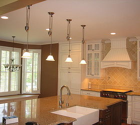 ak kitchen remodels, appliances, countertops, kitchen backsplash, kitchen cabinets, kitchen design, kitchen island, The Franke Fire Clay Double Bowl Farmhouse Sink Rise Fall Pendant Lights Wolf Dual Fuel Range Belle Foret Pot Filler Are Just Some Of The Chef s Favorites