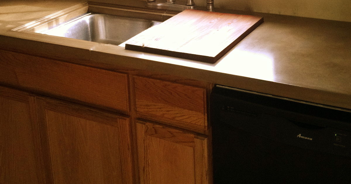 Here Is A Concrete Countertop With Sliding Cutting Board Hometalk