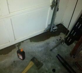 when it rains even slightly i have water running into my garage and under the door, garage doors, garages, inside garage door