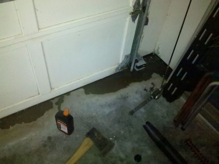when it rains even slightly i have water running into my garage and under the door, garage doors, garages, inside garage door