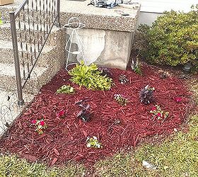 this is my first try at any real gardening the two mulched beds out front of my home, gardening
