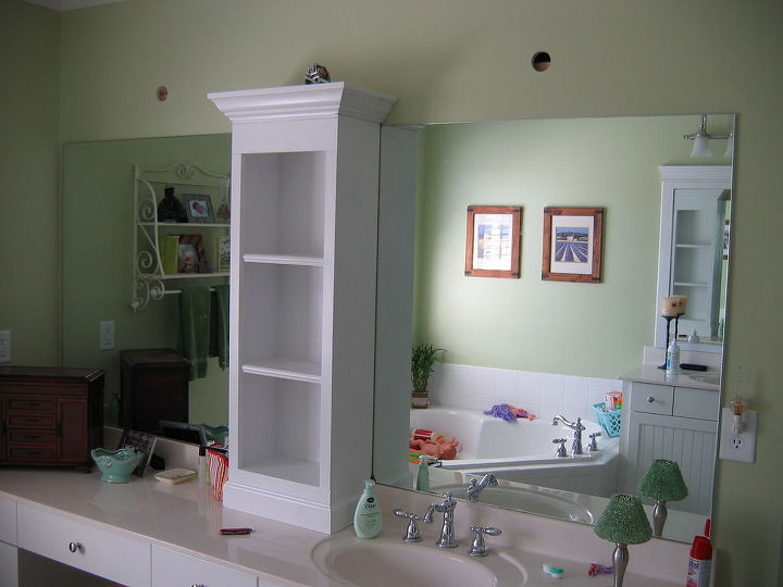 revamp that large bathroom mirror, bathroom ideas, home decor, Added shelving unit and attached to wall just above mirror to help anchor the weight
