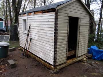 jacking up a shed, Up on new beams