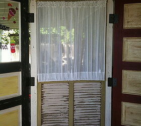 patio divider made from recycled doors, repurposing upcycling, old recycled doors made into patio divider