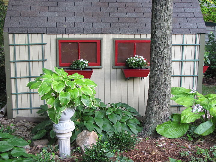 shed makeover, outdoor living, In order to save shelf space inside we added faux windows on the side They add interest without sacrificing any space