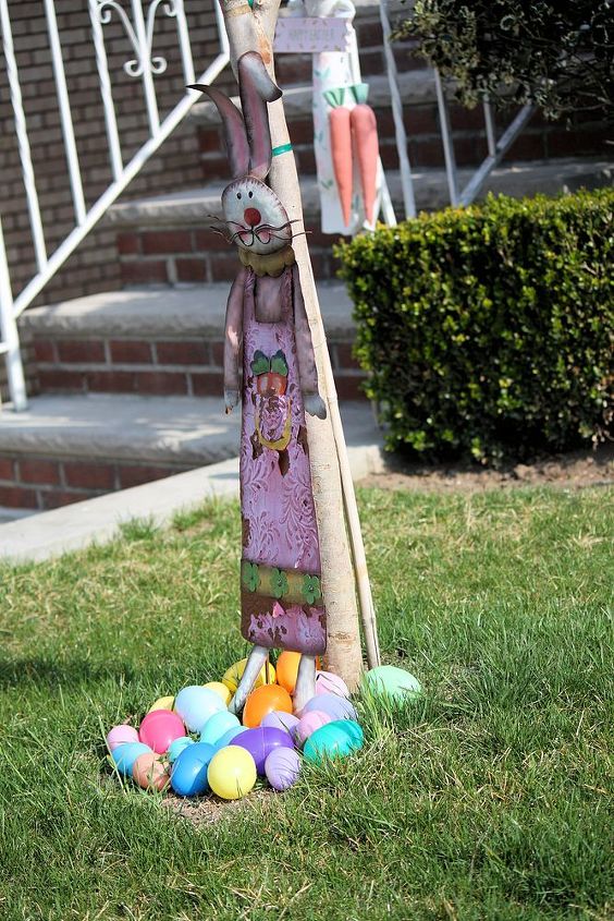 easter decoration for indoor and outdoor, easter decorations, gardening, seasonal holiday d cor, Bunny surrounded by colorful Easter eggs We love bunnies All you need is a bunch of colorful plastic eggs a life size mother bunny and the perfect area for her to get the most attention