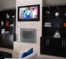 stacked stone fireplace make over, fireplaces mantels, home decor, living room ideas, You can see that Lisa LaPorta from HGTV is right at home on our new built in TV