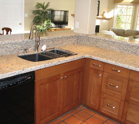 does it work to reface cabinets or should you start over with a complete kitchen, home decor, kitchen design, Adding new doors and drawer fronts coupled with the new granite counter tops made this kitchen an inviting part of their new great room that includes both the family room and spacious dining area