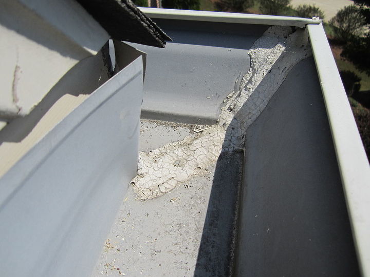 leaky gutter corners are present on almost every house and this almost always leads, curb appeal, home maintenance repairs, roofing, Failed caulking causing soffit leaks