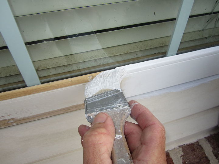 to paint a weathered wood window after scraping sanding and washing we were ready, painting, Sealing the glass with paint