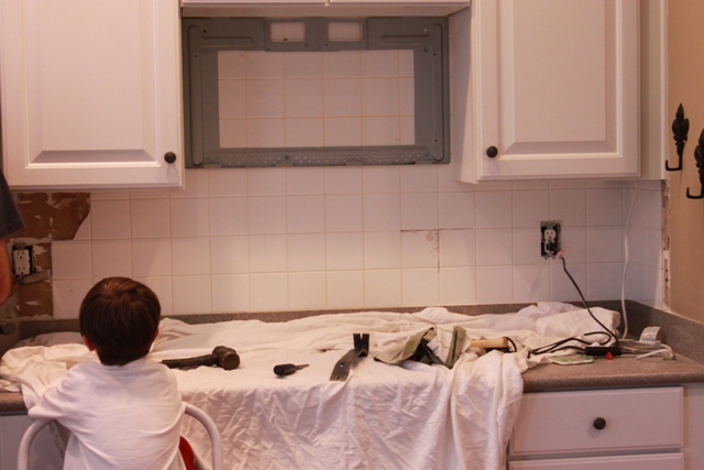 kitchen back splash, kitchen backsplash, kitchen design, tiling, Beginning to remove original tile