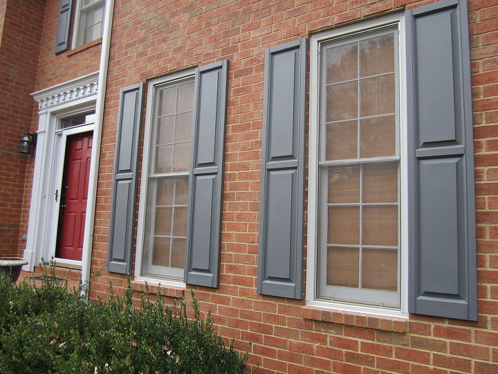doree found us on hometalk when posting questions about new vinyl shutters she was, The new shutters look like wood we also painted the storm door