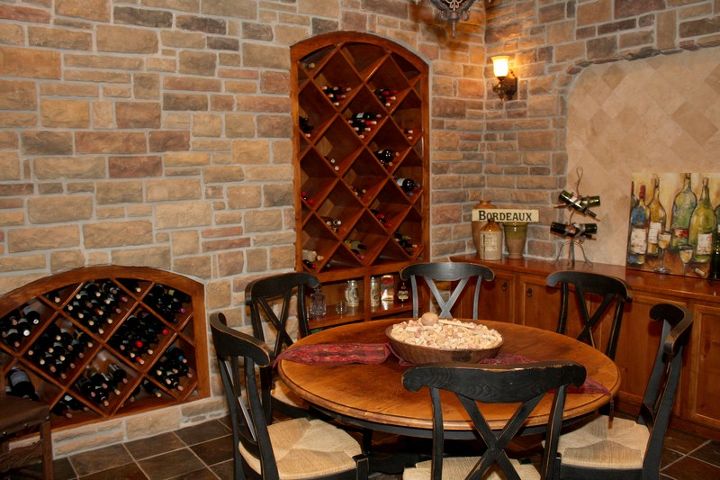 wine grotto meet wine room, fireplaces mantels, home decor, This angel shows more attention to detail with ample wine storage all done with stained Alder Wood