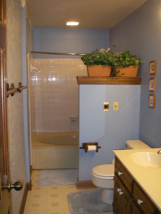 help any decorating ideas for a narrow bathroom want to tile floor but unsure what, bathroom ideas, flooring, home decor, tile flooring, tiling, Double sink vanity with large mirror on right Built in wood cabinet