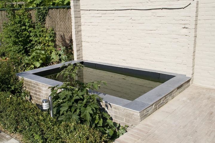turning a garden shed into a pond, concrete masonry, outdoor living, ponds water features, Concrete pond made from an old brick garden shed